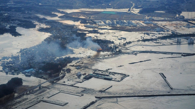 TSUNAMI smoke billows japan.jpg